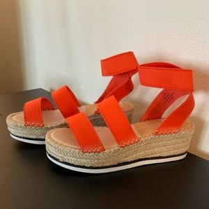 Bright orange wedge sandals